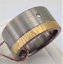 Pierścień z tytanu HADRYŚ "Sabina biczowana" 0,03 ct H/Si